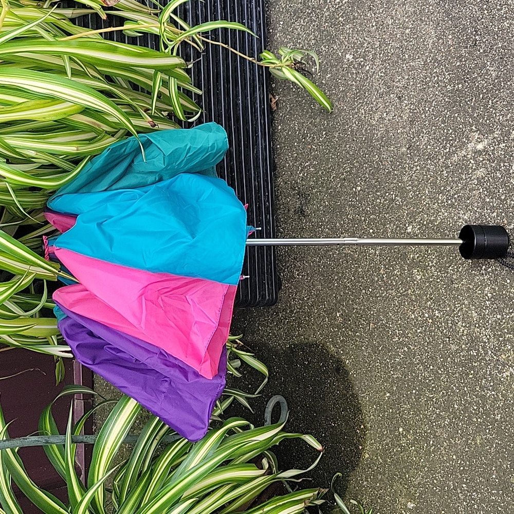 90's Colorful Umbrella. Irw International Rainwear 29" Handle 39" Across. View 2